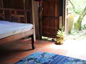 Others 4 Peaceful Homestay in the Middle of Fruit Garden - Room With Four Double Beds
