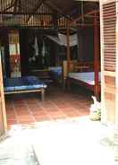 ภาพหลัก Peaceful Homestay in the Middle of Fruit Garden - Room With Four Double Beds