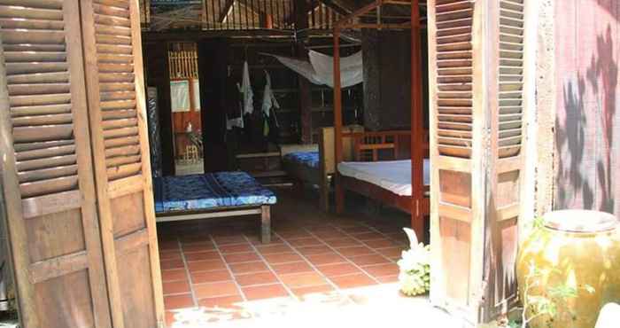 Others Peaceful Homestay in the Middle of Fruit Garden - Room With Four Double Beds