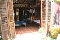 Others Peaceful Homestay in the Middle of Fruit Garden - Room With Four Double Beds