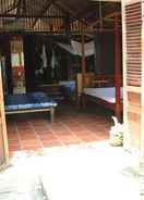 Primary image Homestay thanh bình ở giữa vườn cây ăn quả Garden - Phòng có bốn giường đôi