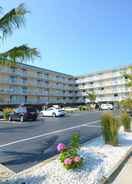 Imej utama Coastal Palms Inn & Suites