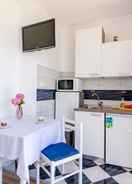 Dapur kecil peribadi Apartments Cypress Sea Cove