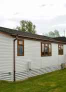 Primary image Beautiful 2-bed Lodge With hot tub and Saunain Ely