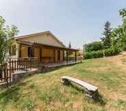 Others 2 Inviting Holiday Home in Serra Sant'abbondio With Garden