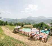 Others 4 Inviting Holiday Home in Serra Sant'abbondio With Garden