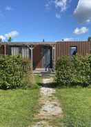 Imej utama Cozy 4 Person Chalet in the Frisian Nature