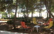 Others 5 Magical Holidays in a Dammuso in Favignana Immersed in a Wonderful Pine Forest