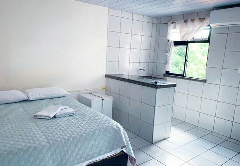 Lain-lain pousada sol e praia