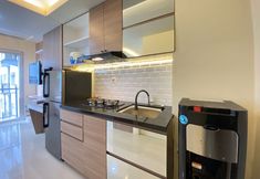 其他 7 Cozy Designed Studio Apartment At Grand Asia Afrika