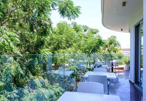 Others Sanders Rio Gardens - Compact 1-bedroom Apartment With Shared Pool and Balcony