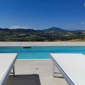 Primary image 1 Glamping at an Agriturismo in the Vineyard, Monte Rinaldo Hotels