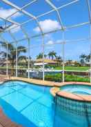 Primary image Woodbine Ct. 1870, Marco Island Vacation Rental 5 Bedroom Home by Redawning