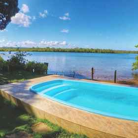 Primary image 1 이타카레 바이아에 있는 카사 데 템포라다 아르카디아, 수영장, 22명 숙박 가능, 5개의 스위트룸 및 바베큐 시설, 콘차 해변 호텔