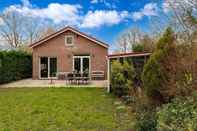 Lainnya Welcoming Holiday Home in Baarland With Fenced Garden