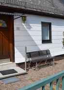 Meja sambut tetamu Detached Holiday Home With Garden on the Edge of the Forest in Ramsbeck, in the Sauerland