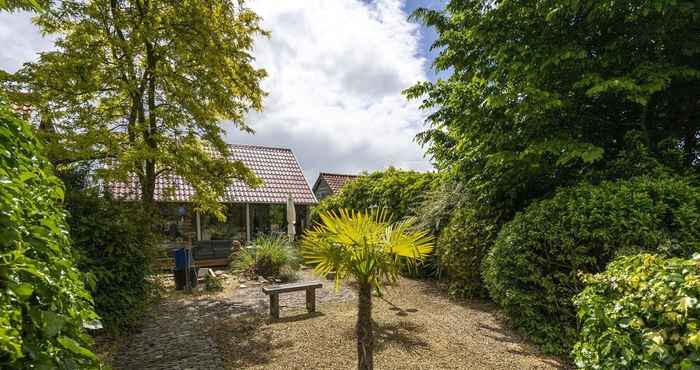 Lain-lain Romantic Chalet With Tropical Garden Near Wilhelminadorp