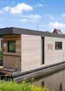 Imej utama Brand new Boathouse on the Water in Stavoren With a Garden