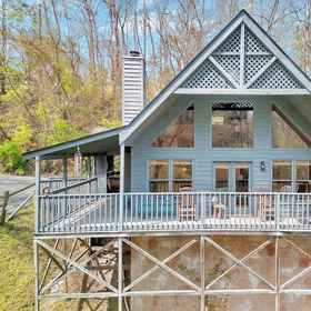 Primary image 1 Tranquility - Quiet And Comfortable Cabin! Close To The Tanger Outlet Shopping 2 Bedroom Cabin by RedAwning, Hatfield and McCoy Dinner Show Hotels