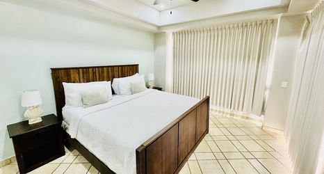 Others 2 Spectacular 1 1/2 Bedroom Condo on Sandy Beach at Las Palmas Beachfront Resort 1 Condo by RedAwning