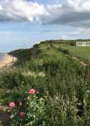 ภาพหลัก Captivating 2-bed Beachfront Sea-view Norfolk Home