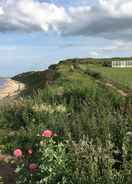 ภาพหลัก Captivating 2-bed Beachfront Sea-view Norfolk Home