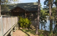 อื่นๆ 7 Two Bedroom, two Bath, Log-sided, Luxury Harbor North Cottage Overlooking Lake Ouachita. by Redawning