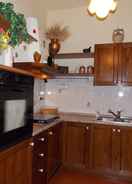 Private kitchen Montecarulli Apartments