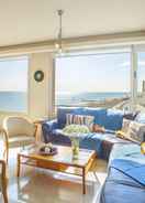 Bilik Mackenzie Eftyhia Beachfront Suite