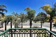 Others Tavira Palm Tree by Homing