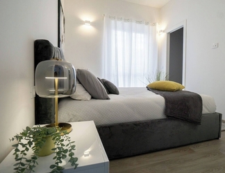 Others 2 Charming and Modern Three-bedroom Apartment in the Heart of the City of Asti