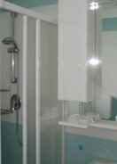Bathroom Beautiful Apartment a few Meters From Bibione Beach - By Beahost Rentals