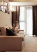 Foto utama Cozy 1BR in Uptown Parksuites T2 bgc Tag