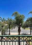 Room Tavira Palm Tree by Homing