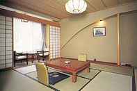 Phòng ngủ Ryokan Koyokan