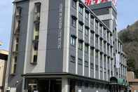 Exterior Niimi Business City Hotel