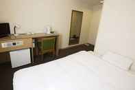 Kamar Tidur Business Hotel Suncity Nigokan