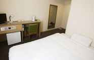 Bedroom 3 Business Hotel Suncity Nigokan