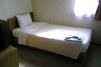 Kamar Tidur Woody Hotel Suwa