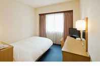 ห้องนอน Kofu Hotel