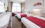 ห้องนอน 5 Takarazuka Hotel