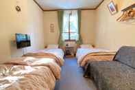 Kamar Tidur Petite Pension Green Grass