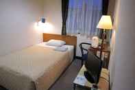 ห้องนอน Shirota Hotel