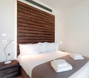 Kamar Tidur 7 Amphora Hotel & Suites