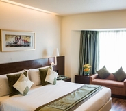 Kamar Tidur 3 Radisson Gurugram Sohna Road City Center