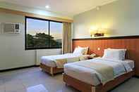 ห้องนอน The Orchard Cebu Hotel & Suites