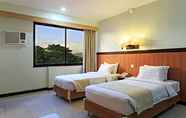 Kamar Tidur 4 The Orchard Cebu Hotel & Suites