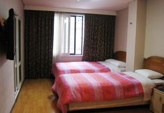 Bedroom 4 Brown Tourism Hotel