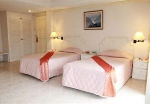 ห้องนอน Sansabai Pearl Resortel