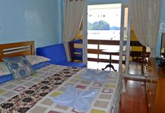 Kamar Tidur 6 Pura Vida Inn & Tours